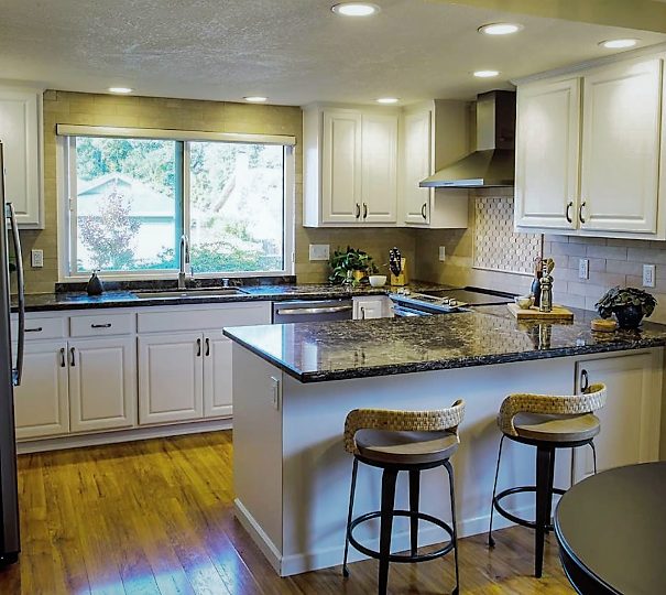 After cabinet refacing - Kitchen Remodel - white and black 36